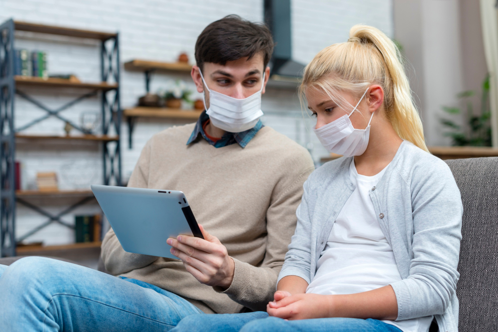 GP and patient discussing global medical diagnostics results during an NHS consultation
