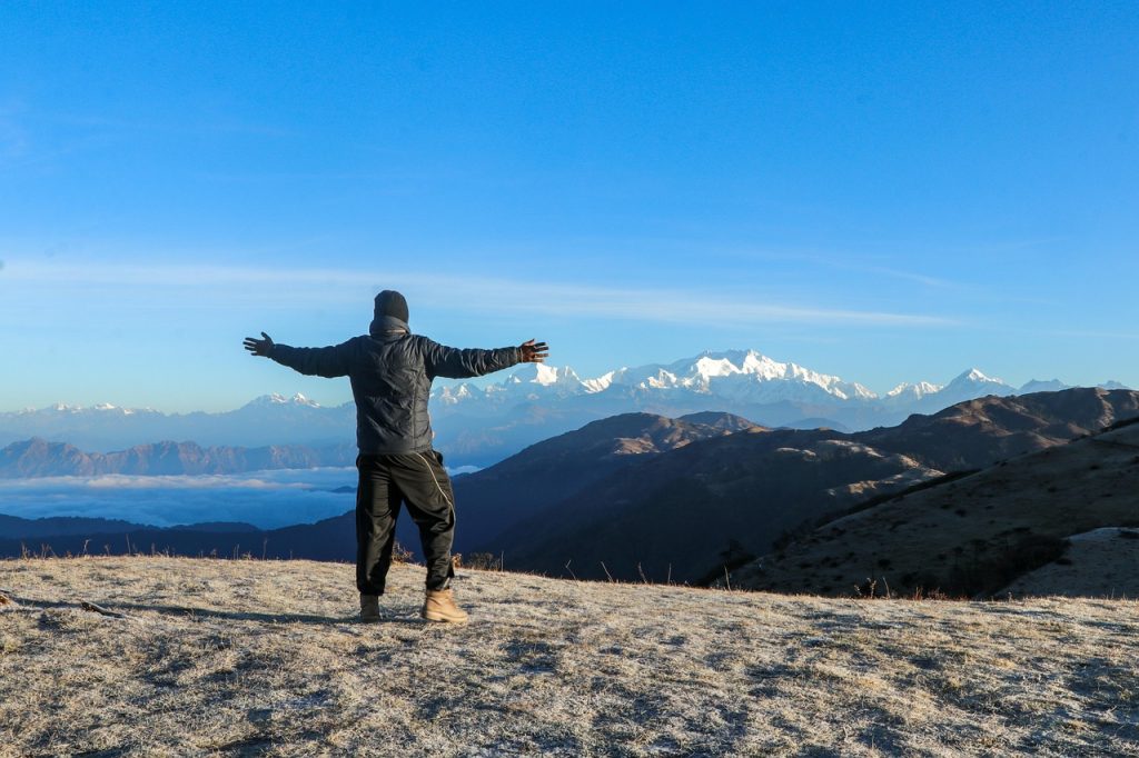 A man Looking At Slleping Buddha At Sandakphu Phalut Trek