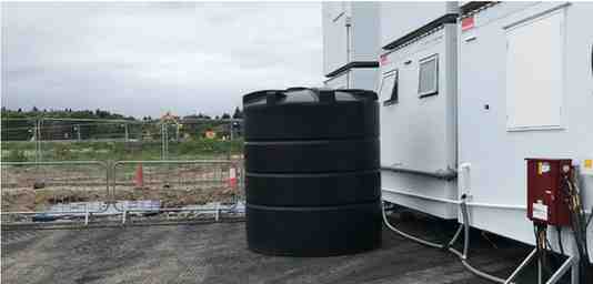 Temporary water tanker supplying water to an active New Zealand project site