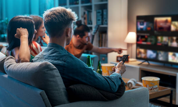 4K IPTV streaming service showing live sports and entertainment on a modern smart TV