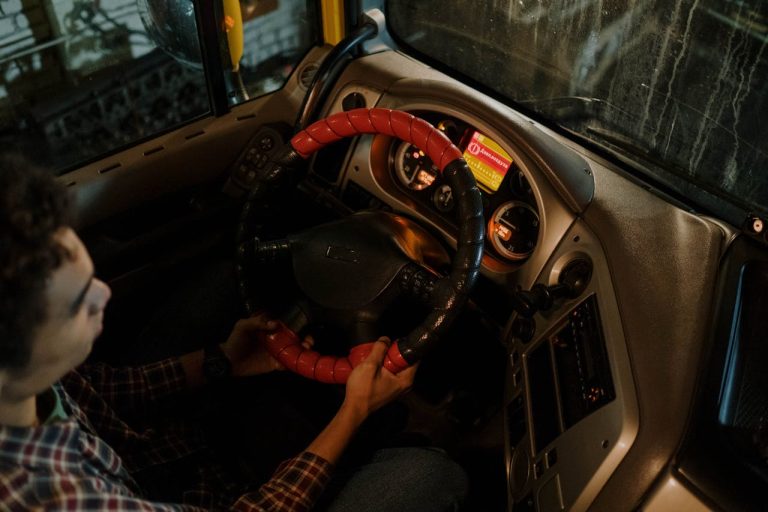 Photo by cottonbro studio: https://www.pexels.com/photo/overhead-shot-of-a-man-driving-7541984/