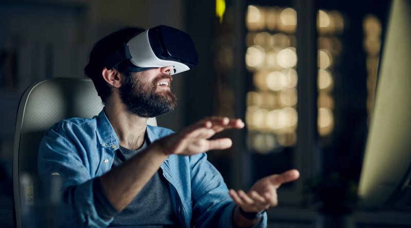 Man testing the Metaverse via VR device